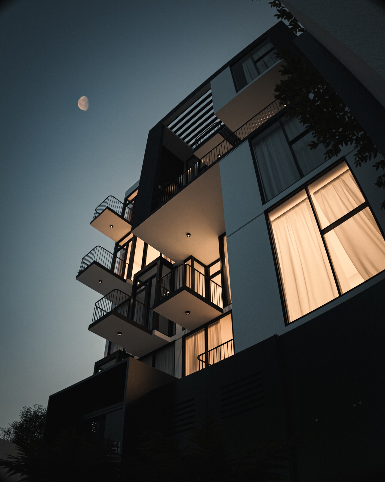 Edificio en blue hour con los interiores encendidos