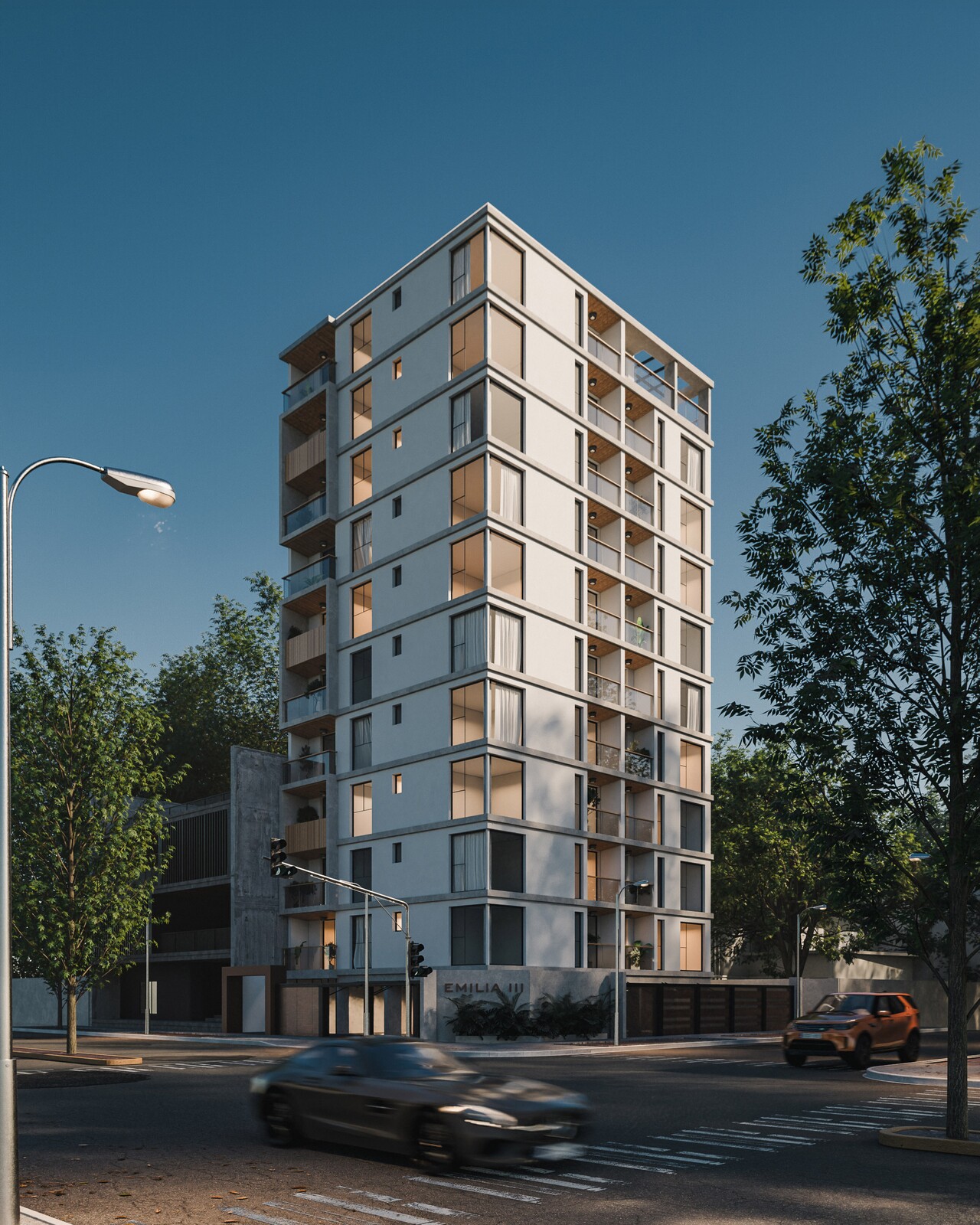 Edificio Emilia III en esquina, con autos estacionados y vereda